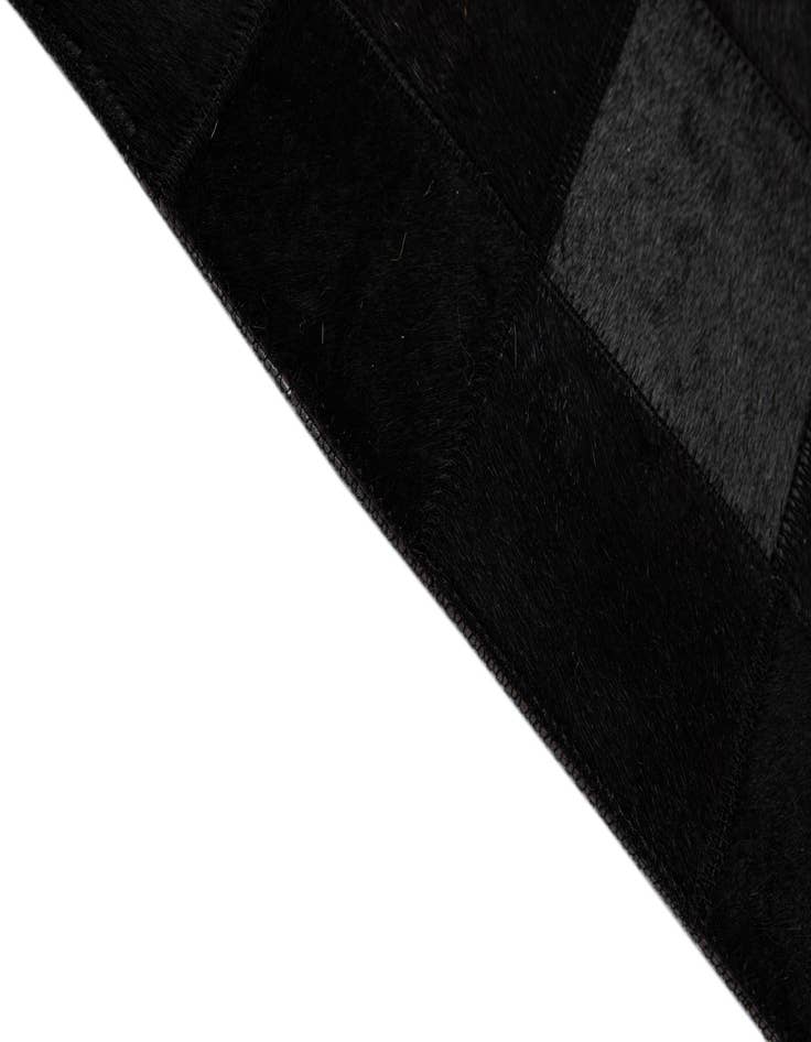 Detail image of 5' 3 x 8' 2 Cowhide - Patchwork Rug