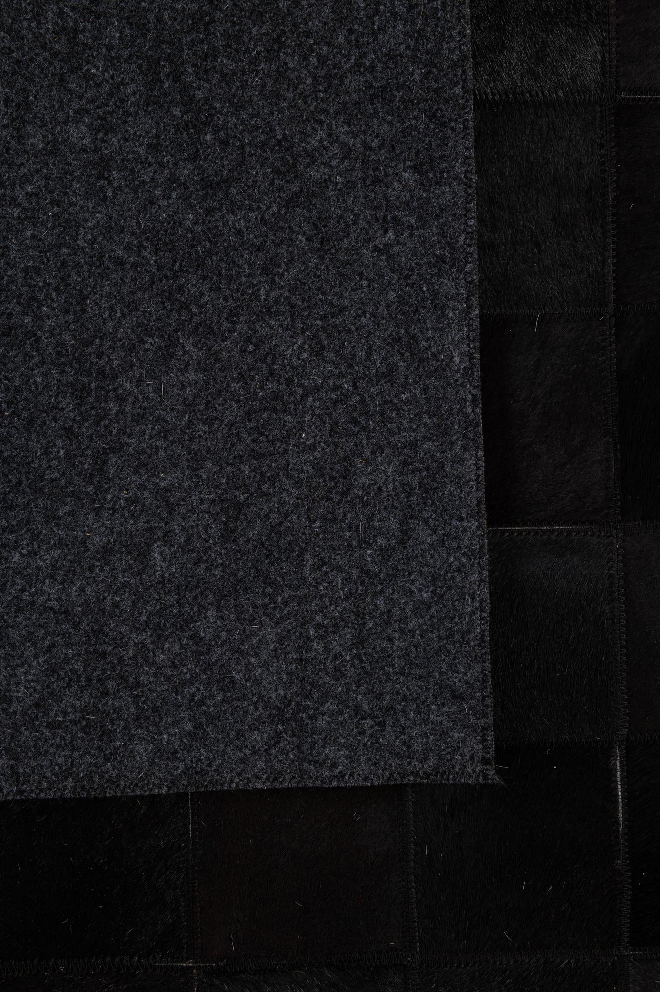 5' 3 x 8' 2 Cowhide - Patchwork Rug