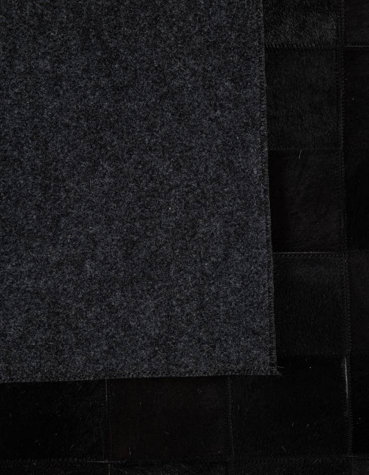 Detail image of 5' 3 x 8' 2 Cowhide - Patchwork Rug