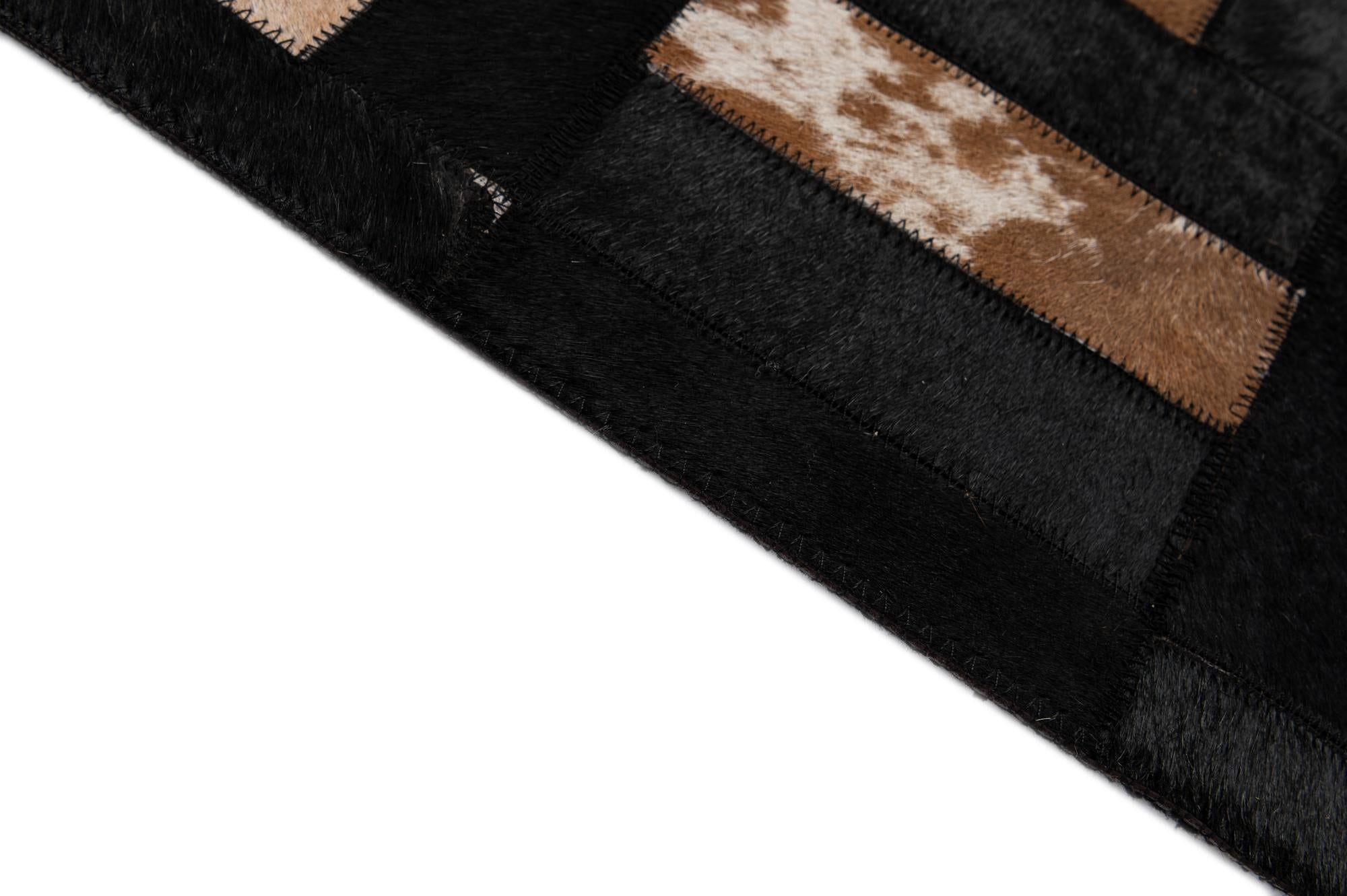 5' 3 x 8' 1 Cowhide - Patchwork Rug