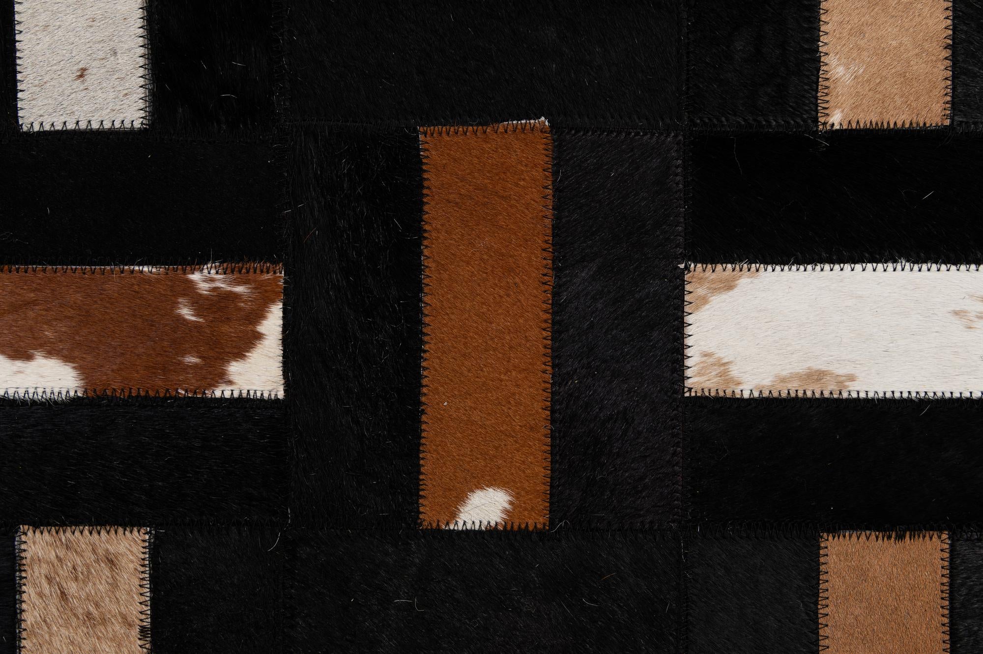 5' 3 x 8' 1 Cowhide - Patchwork Rug