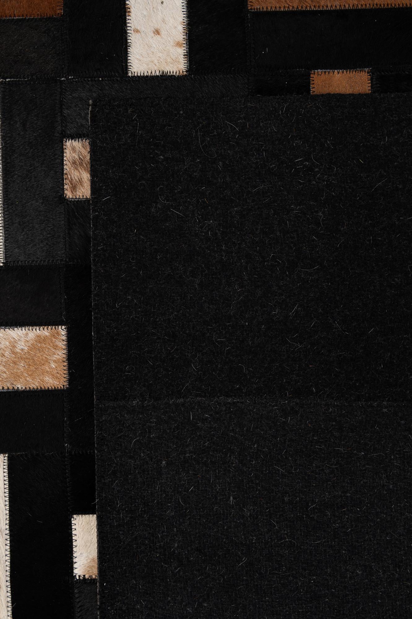 5' 3 x 8' 1 Cowhide - Patchwork Rug