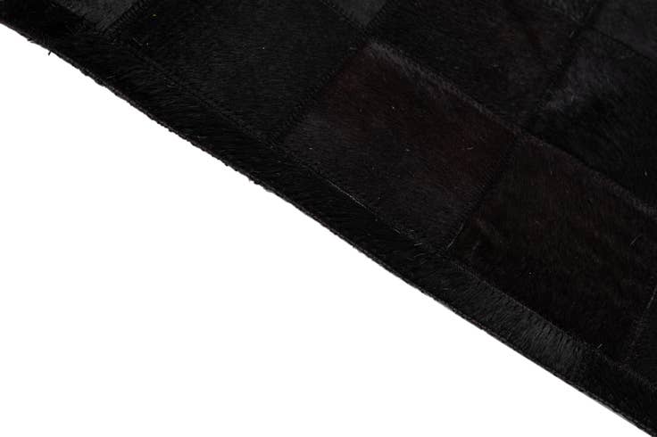 Detail image of 5' 2 x 8' Cowhide - Patchwork Rug