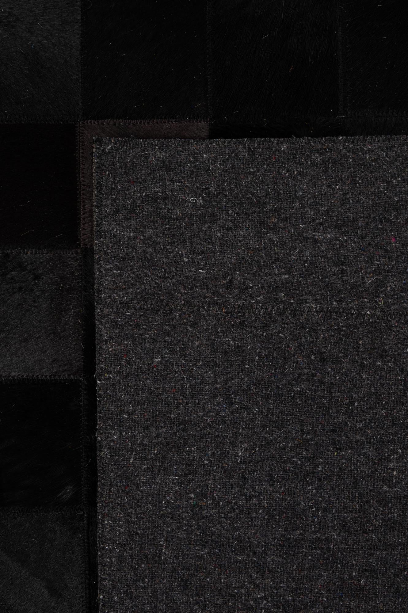 5' 2 x 8' 1 Cowhide - Patchwork Rug