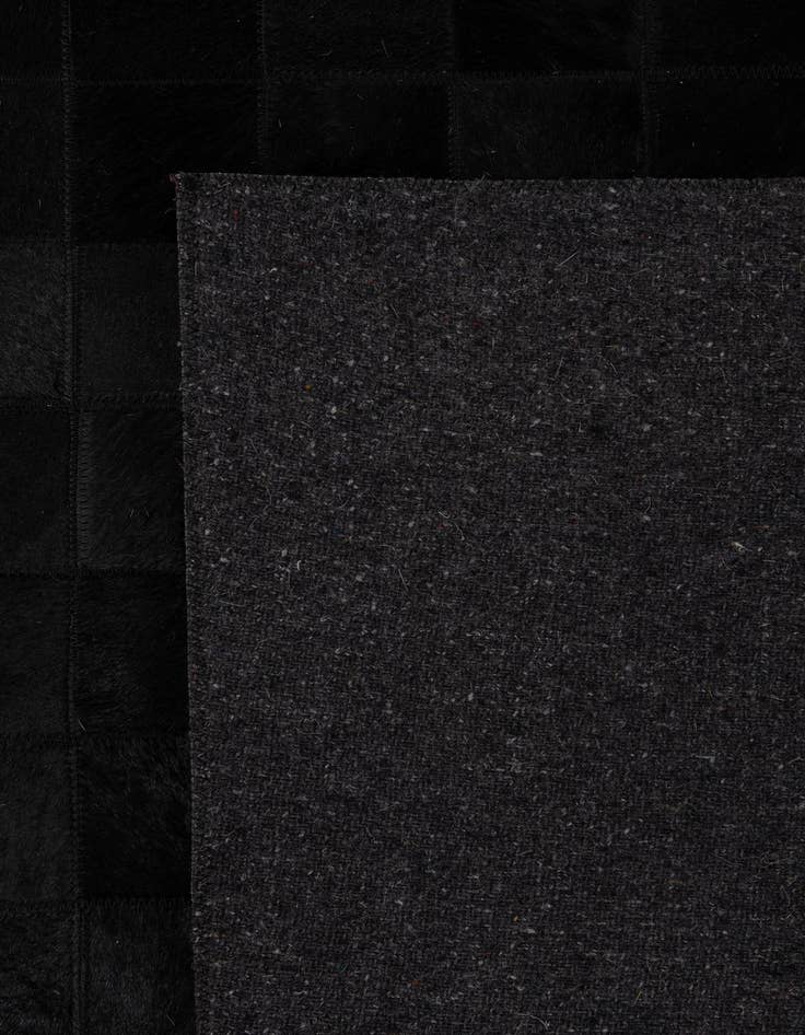 Detail image of 5' 3 x 8' 2 Cowhide - Patchwork Rug