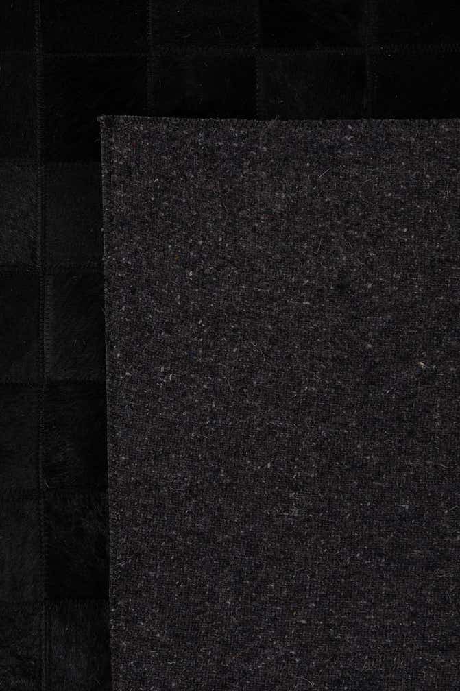 5' 3 x 8' 2 Cowhide - Patchwork Rug