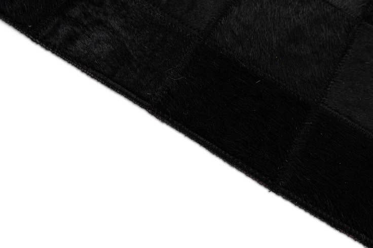 Detail image of 5' 3 x 8' 1 Cowhide - Patchwork Rug