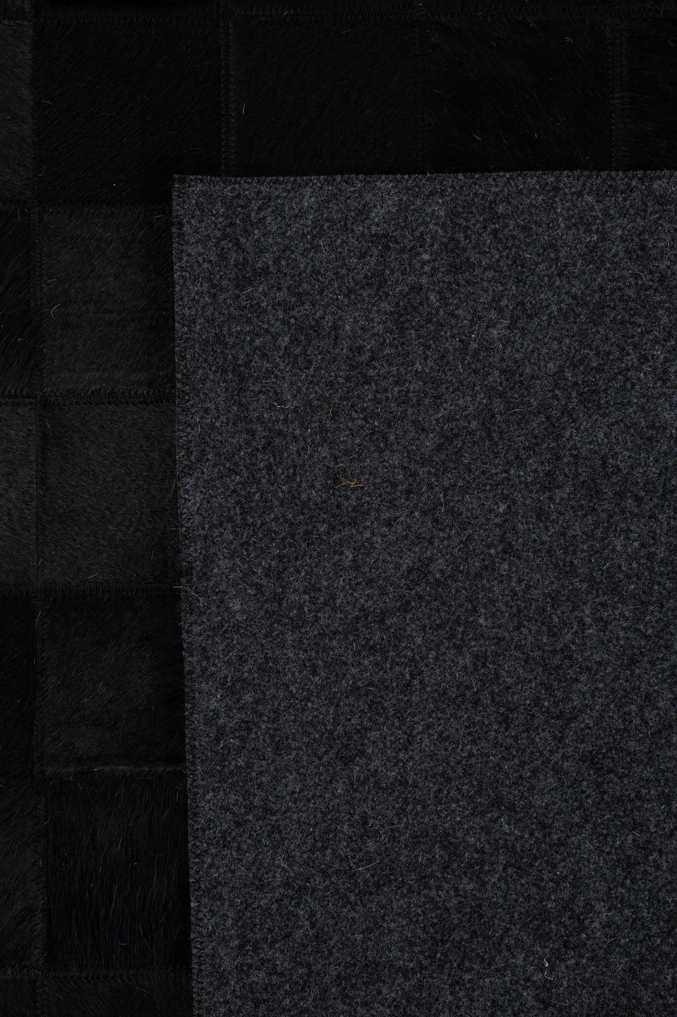 5' 3 x 8' 1 Cowhide - Patchwork Rug