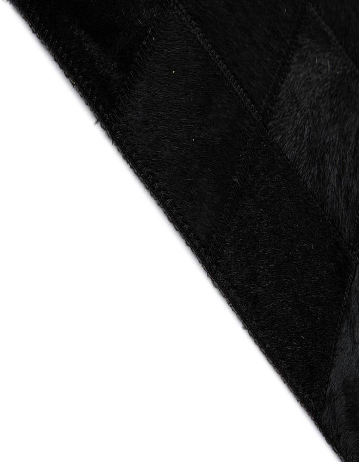 Detail image of 5' 3 x 8' 2 Cowhide - Patchwork Rug