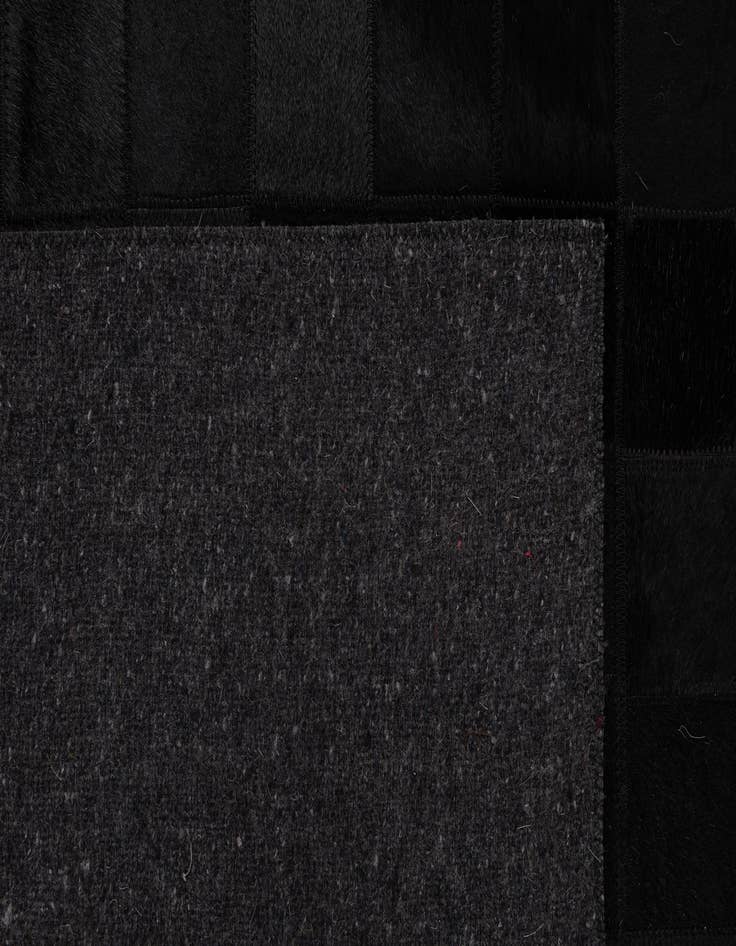 Detail image of 5' 3 x 8' 2 Cowhide - Patchwork Rug