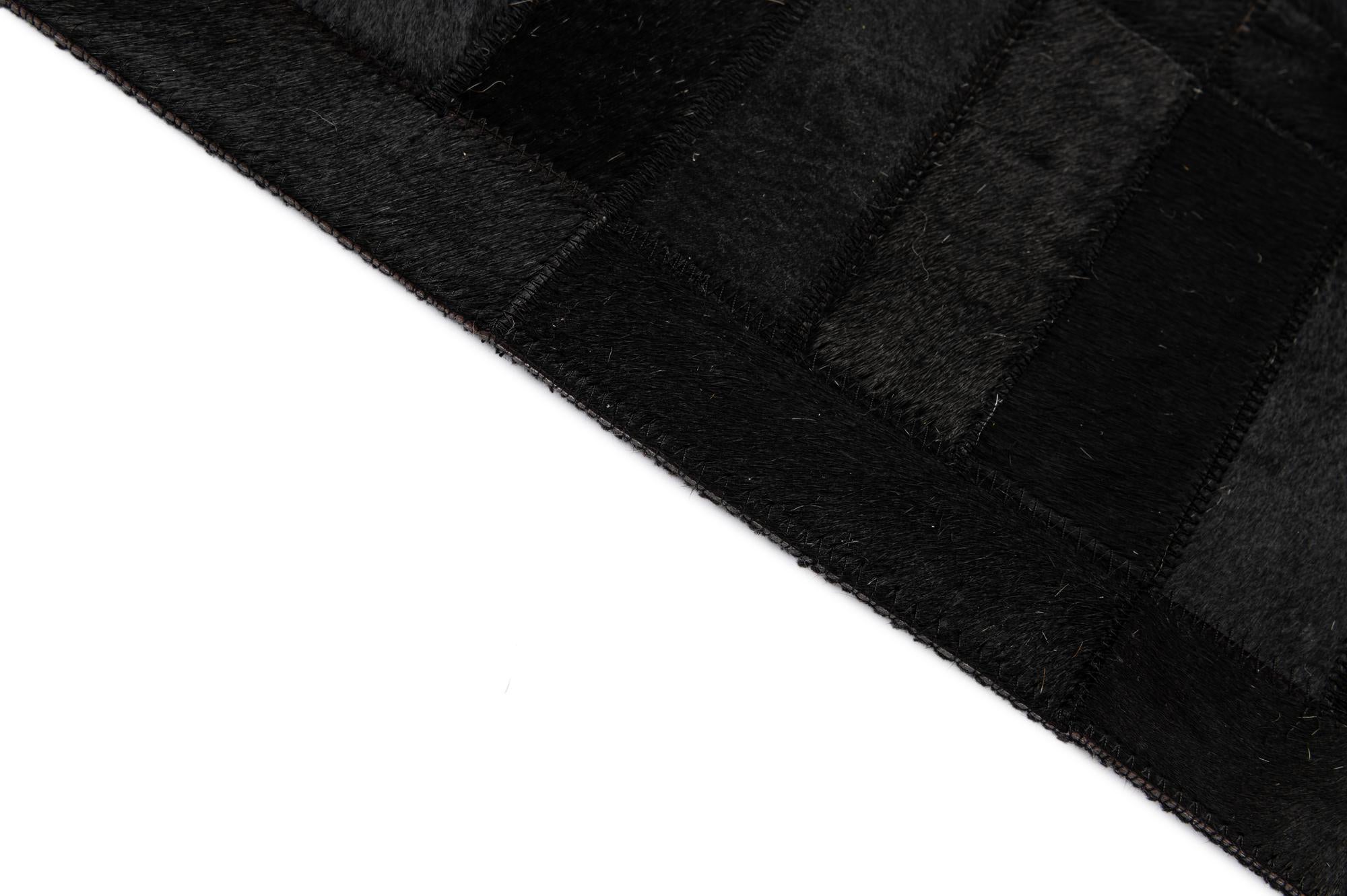 5' 3 x 8' 1 Cowhide - Patchwork Rug