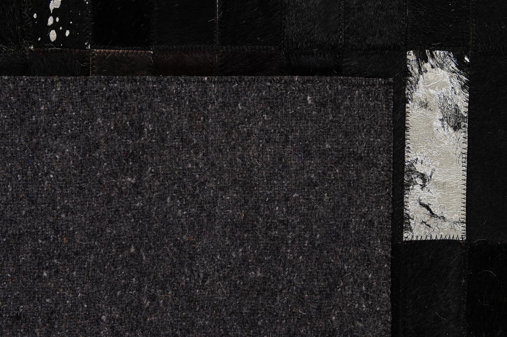 5' 3 x 8' 1 Cowhide - Patchwork Rug