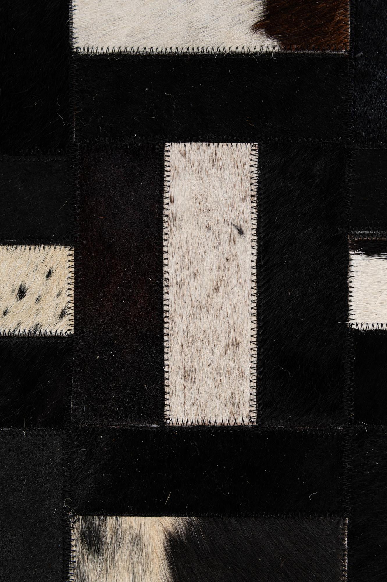 5' 3 x 8' 1 Cowhide - Patchwork Rug