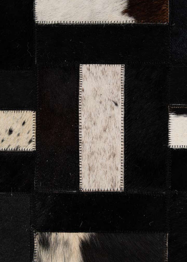 5' 3 x 8' 1 Cowhide - Patchwork Rug