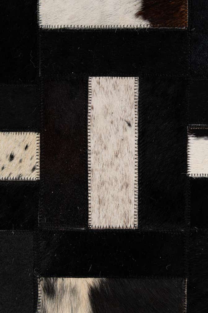 5' 3 x 8' 1 Cowhide - Patchwork Rug