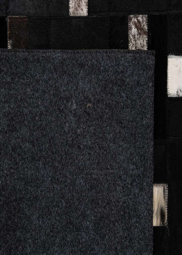 5' 3 x 8' 1 Cowhide - Patchwork Rug