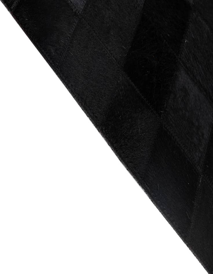 Detail image of 5' 3 x 8' 2 Cowhide - Patchwork Rug