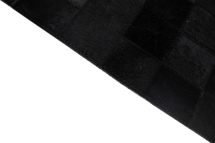 Detail image of 5' 3 x 8' 2 Cowhide - Patchwork Rug