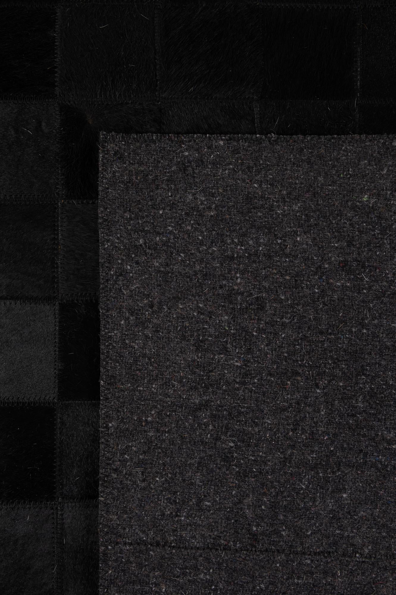 5' 3 x 8' 2 Cowhide - Patchwork Rug