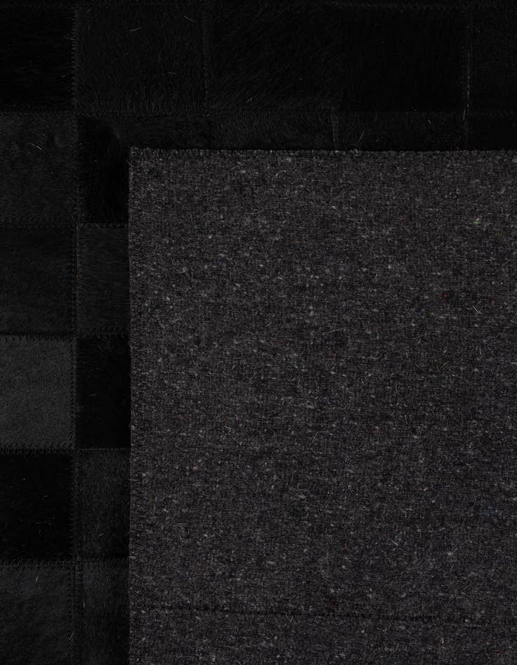 Detail image of 5' 3 x 8' 2 Cowhide - Patchwork Rug