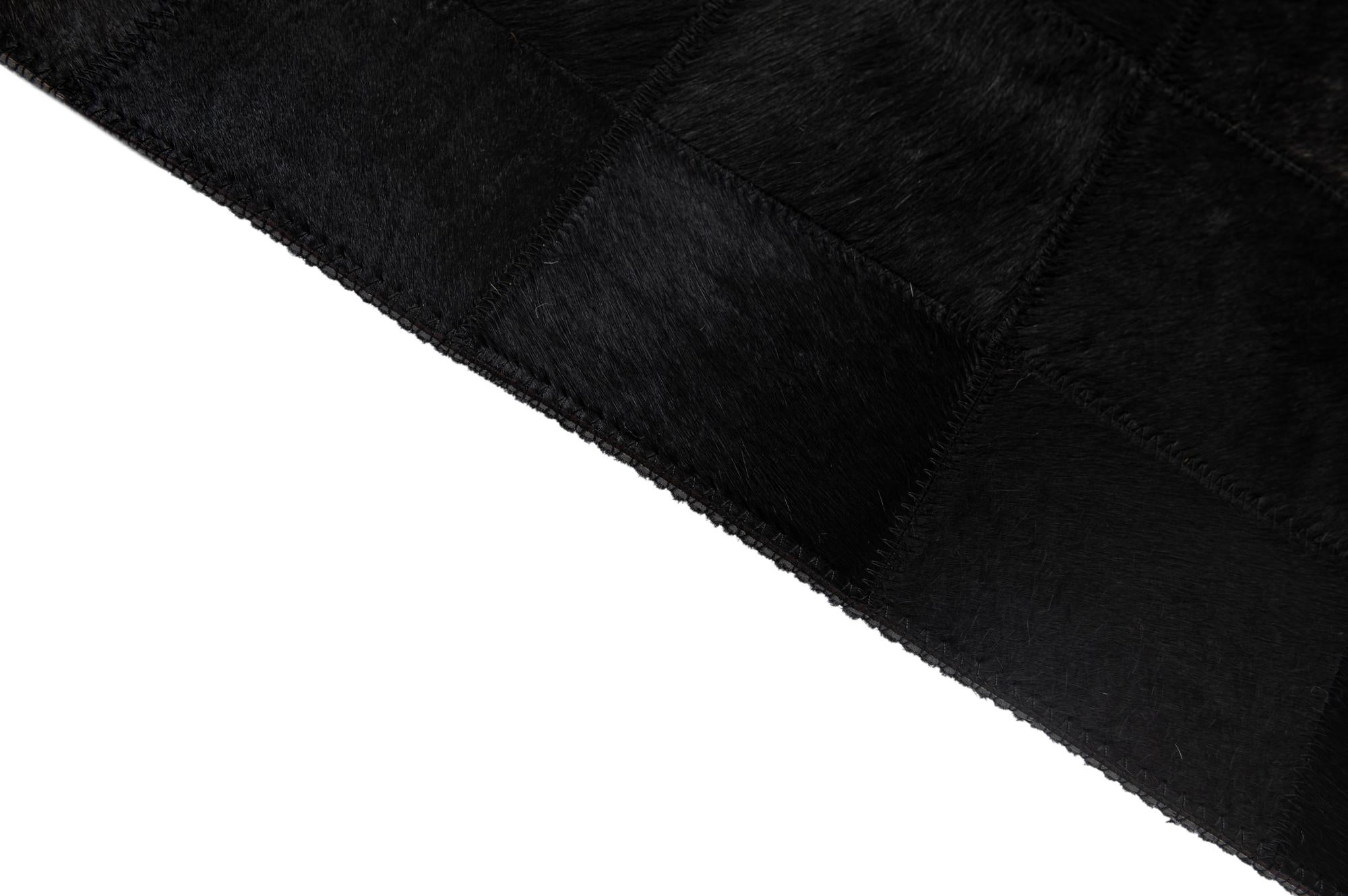5' 3 x 8' 1 Cowhide - Patchwork Rug