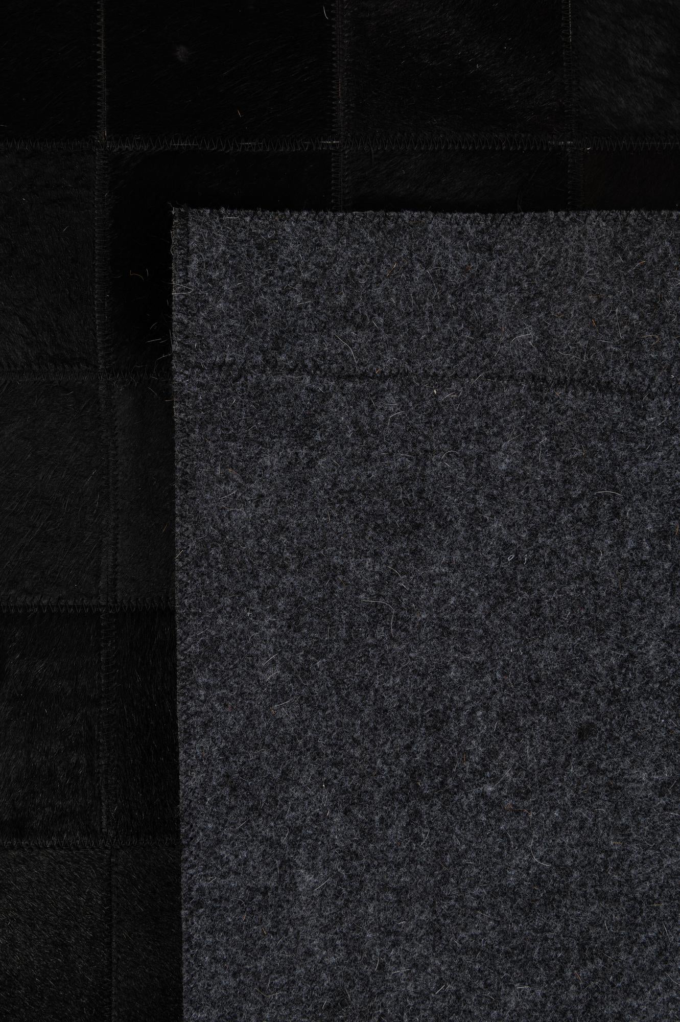 5' 3 x 8' 1 Cowhide - Patchwork Rug
