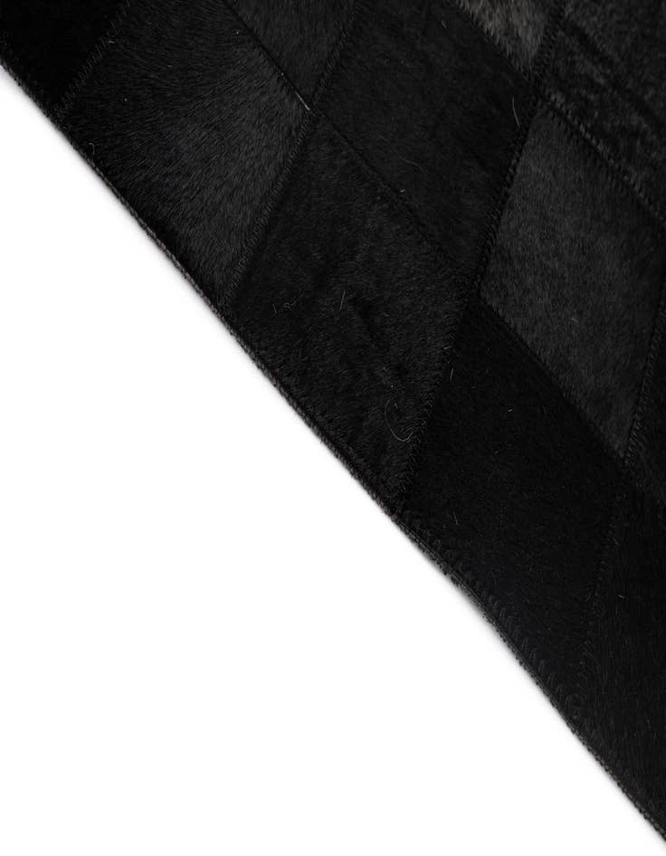 Detail image of 5' 3 x 8' 2 Cowhide - Patchwork Rug