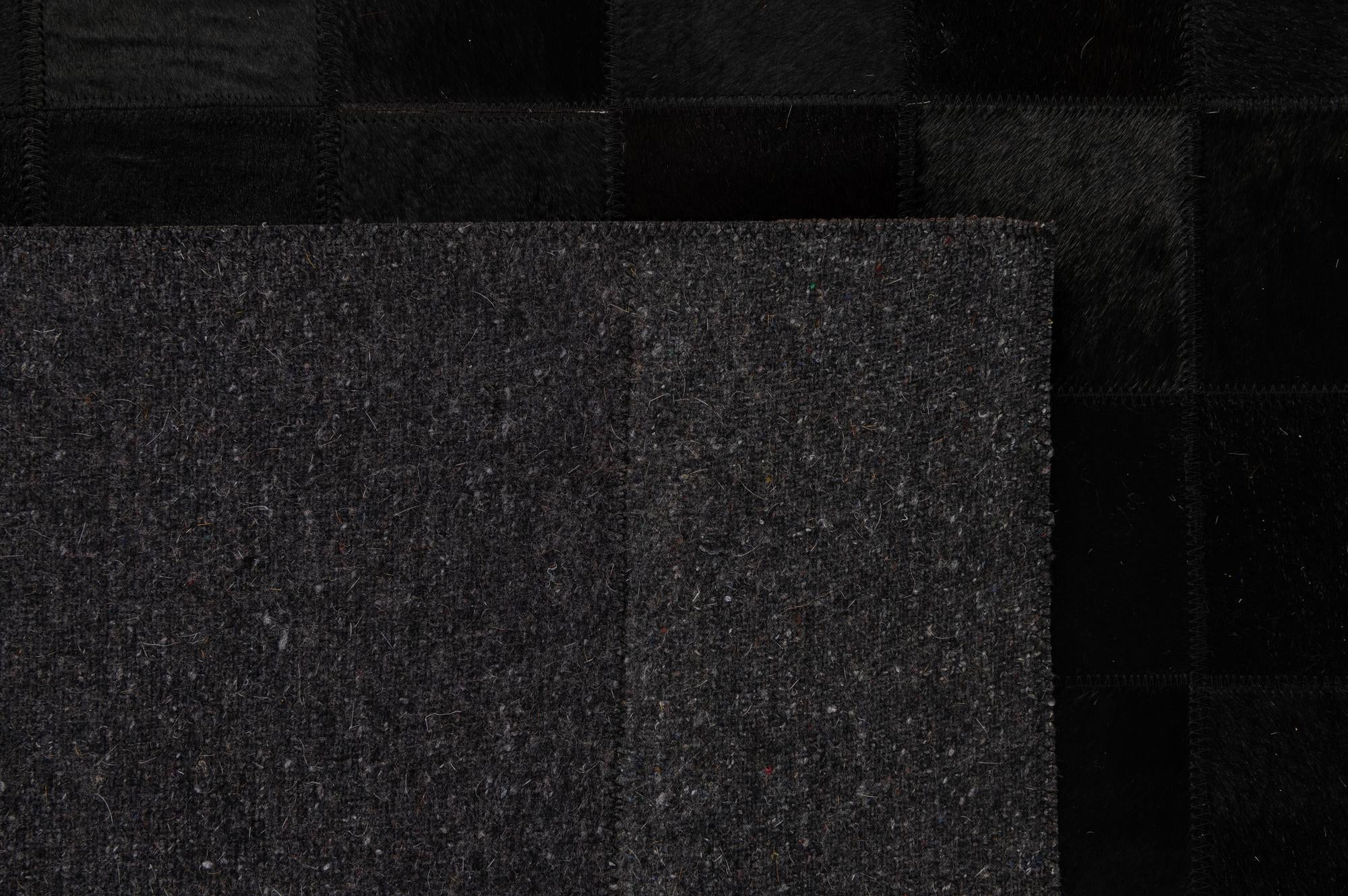 5' 3 x 8' 2 Cowhide - Patchwork Rug
