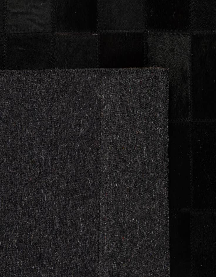 Detail image of 5' 3 x 8' 2 Cowhide - Patchwork Rug