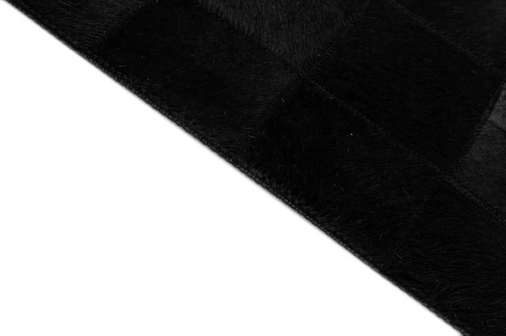 Detail image of 5' 3 x 8' 2 Cowhide - Patchwork Rug