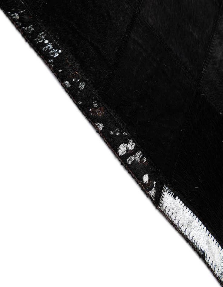 Detail image of 5' 2 x 8' 1 Cowhide - Patchwork Rug