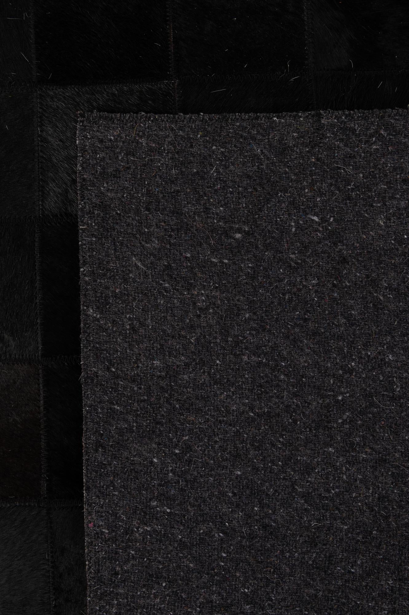 5' 2 x 8' 1 Cowhide - Patchwork Rug