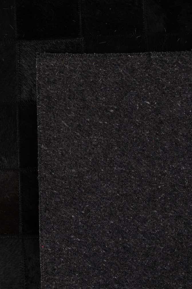 5' 2 x 8' 1 Cowhide - Patchwork Rug