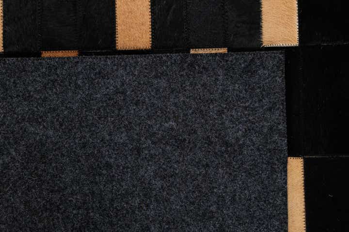 5' 1 x 7' 11 Cowhide - Patchwork Rug