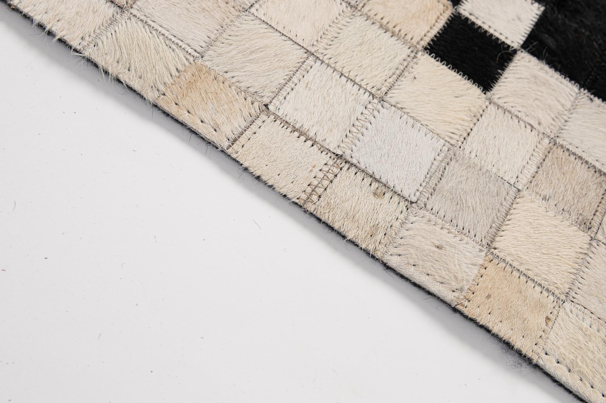 5' x 8' 2 Cowhide - Patchwork Rug