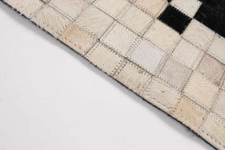 5' x 8' 2 Cowhide - Patchwork Rug