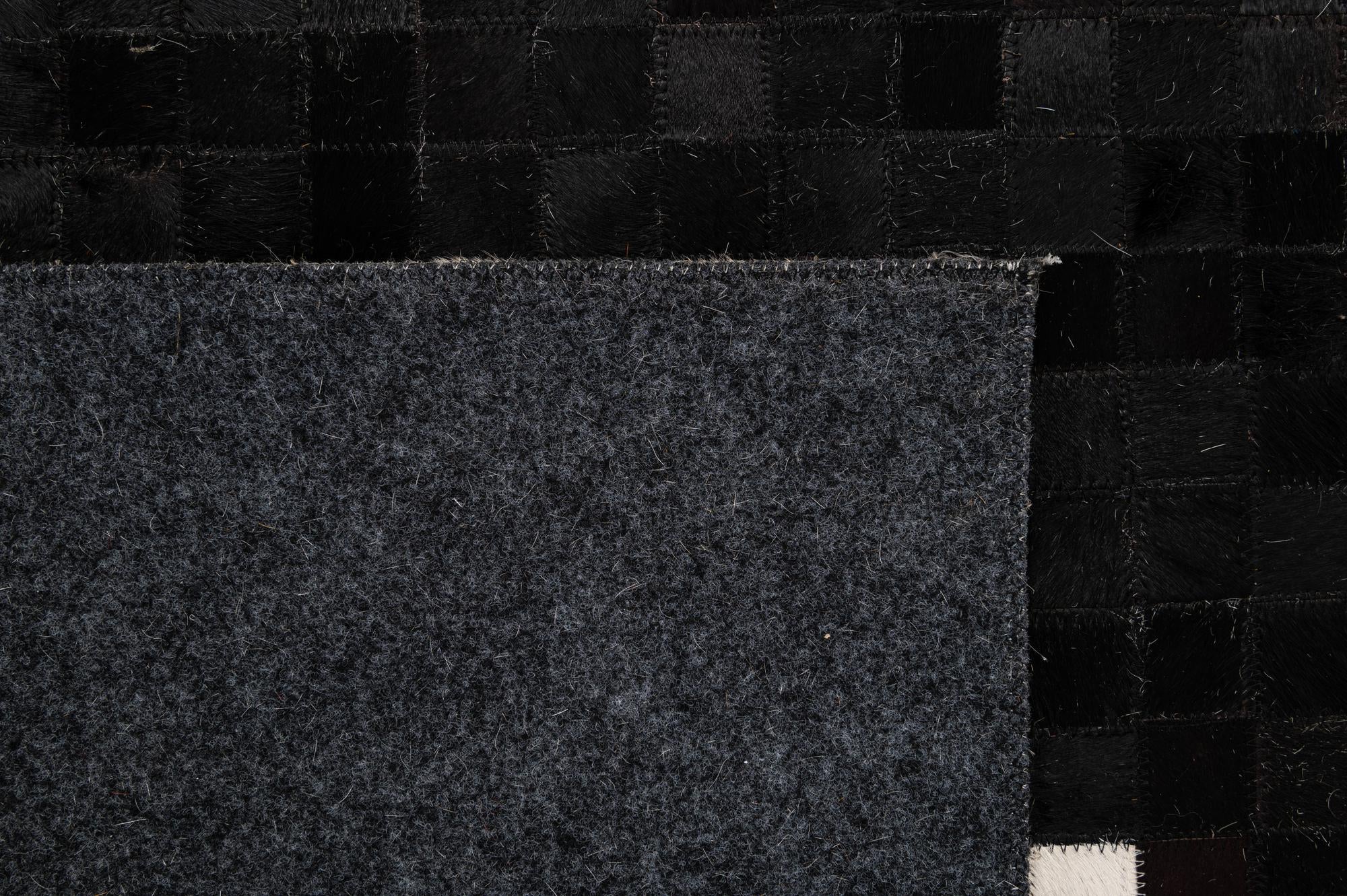 5' x 8' 2 Cowhide - Patchwork Rug