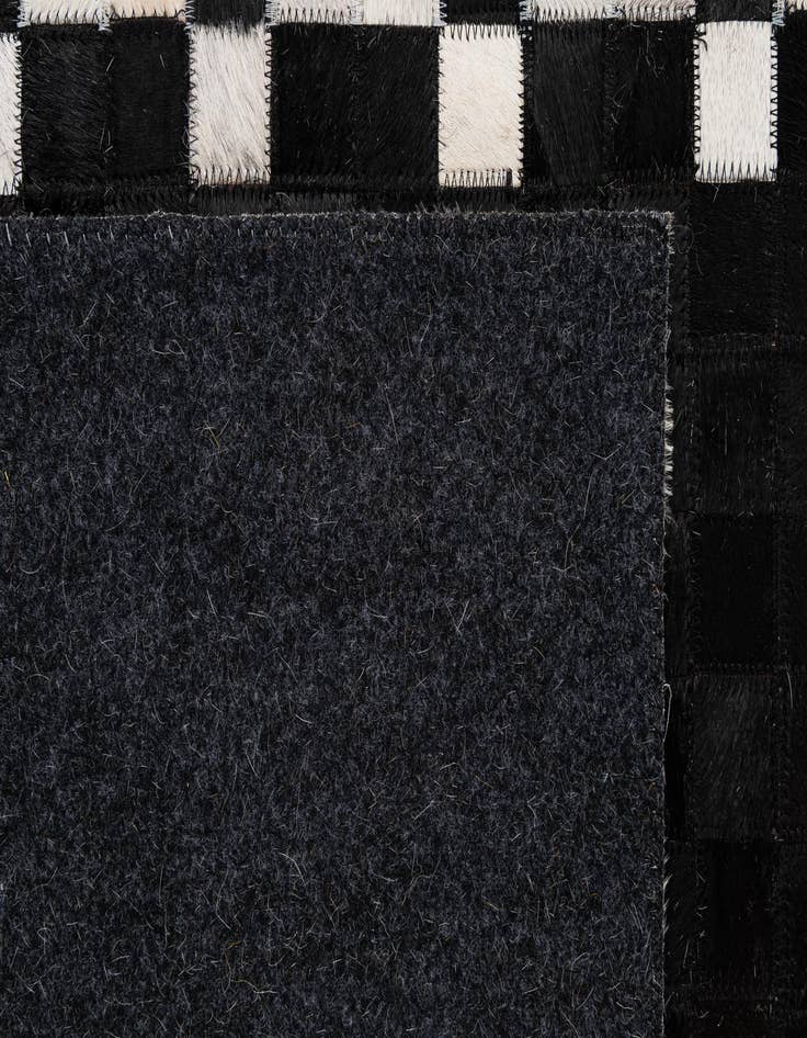 Detail image of 5' 2 x 7' 11 Cowhide - Patchwork Rug