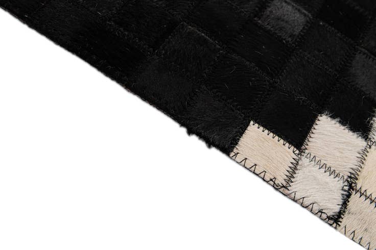 Detail image of 5' 2 x 8' Cowhide - Patchwork Rug