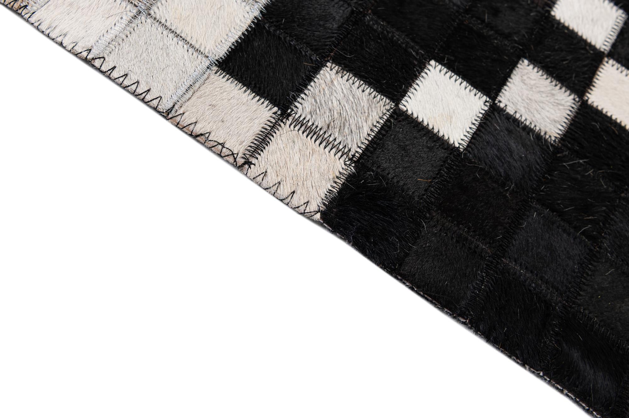5' 2 x 8' 1 Cowhide - Patchwork Rug