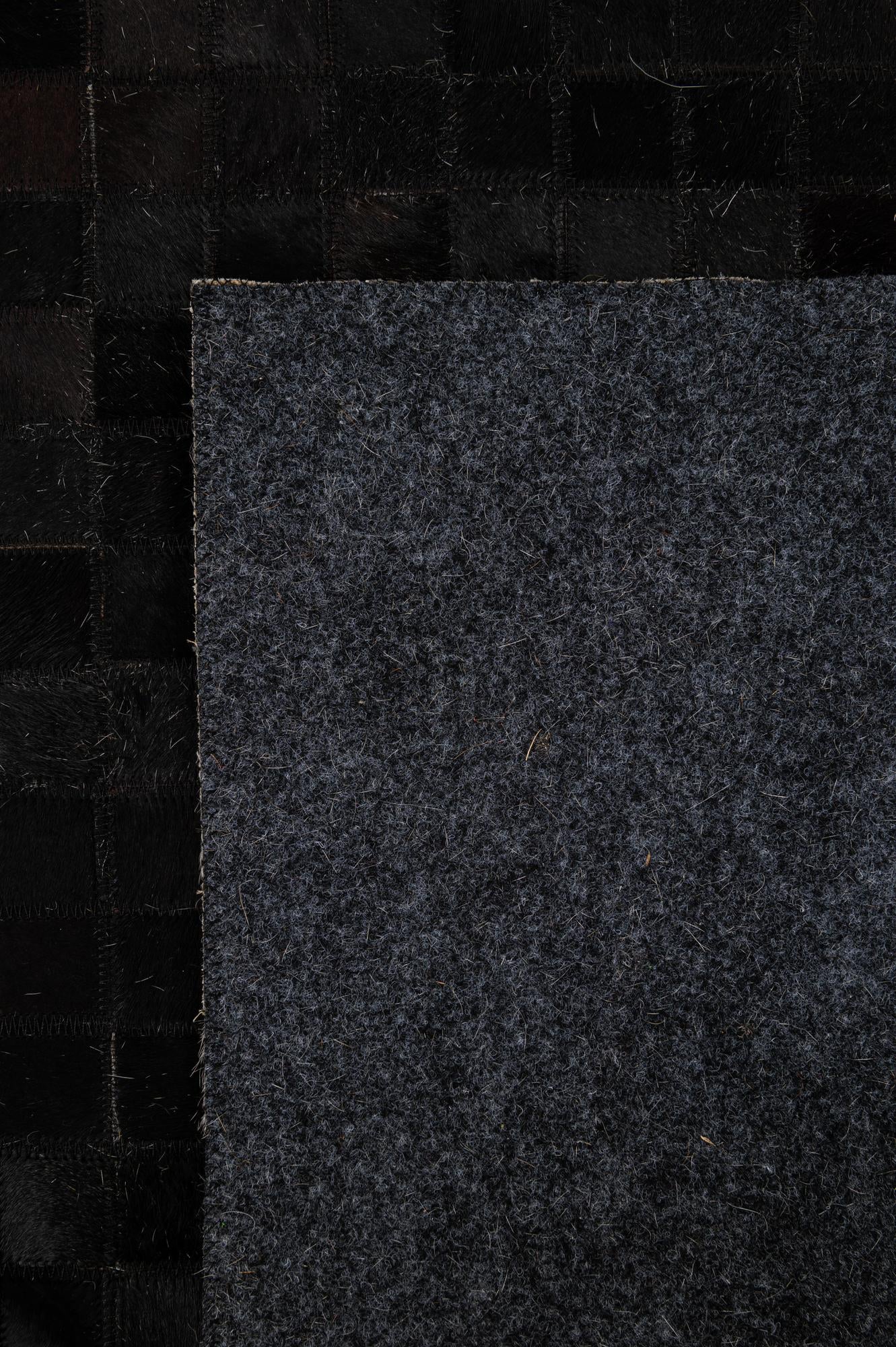 5' 2 x 8' 1 Cowhide - Patchwork Rug