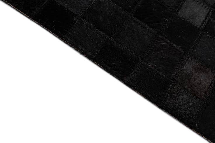 Detail image of 5' 1 x 7' 11 Cowhide - Patchwork Rug