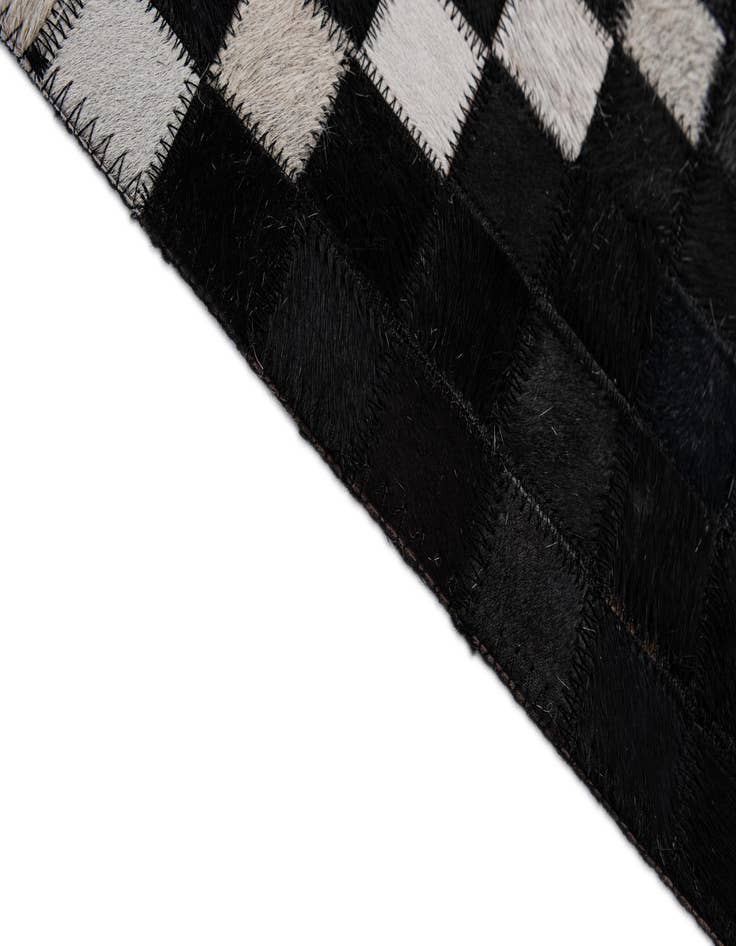 Detail image of 5' x 7' 11 Cowhide - Patchwork Rug