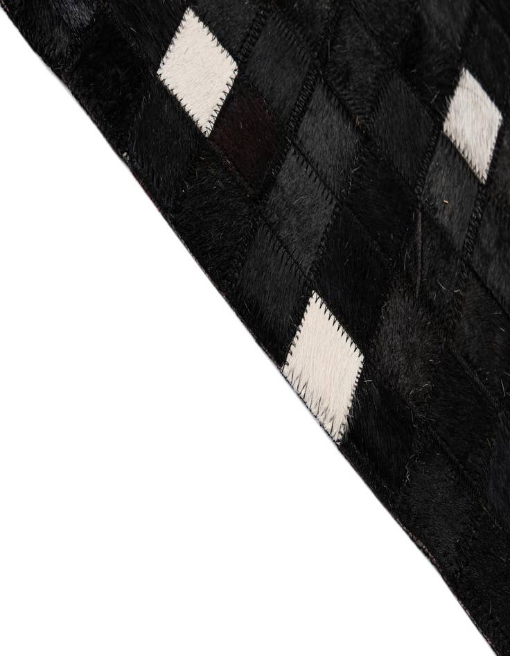 Detail image of 5' 2 x 8' 2 Cowhide - Patchwork Rug