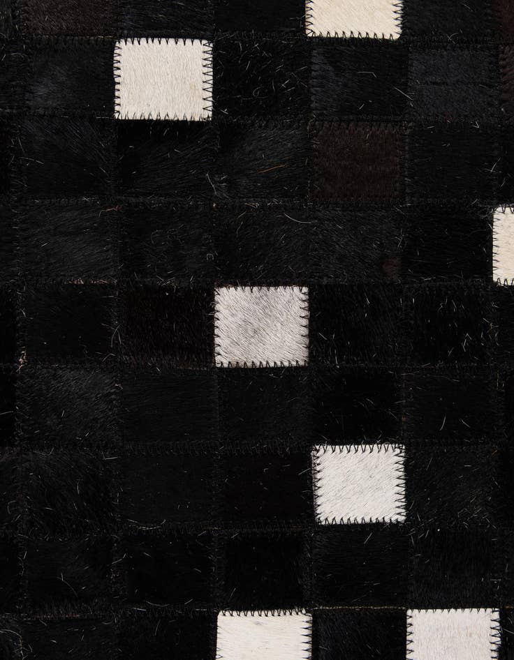 Detail image of 5' 2 x 8' 2 Cowhide - Patchwork Rug