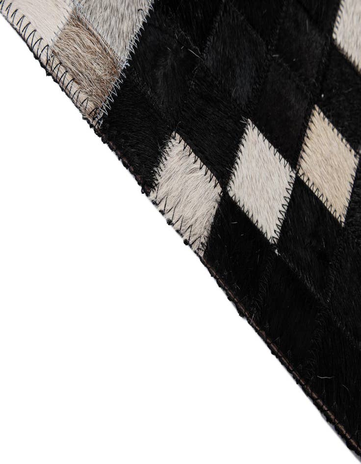 Detail image of 5' 1 x 8' 1 Cowhide - Patchwork Rug
