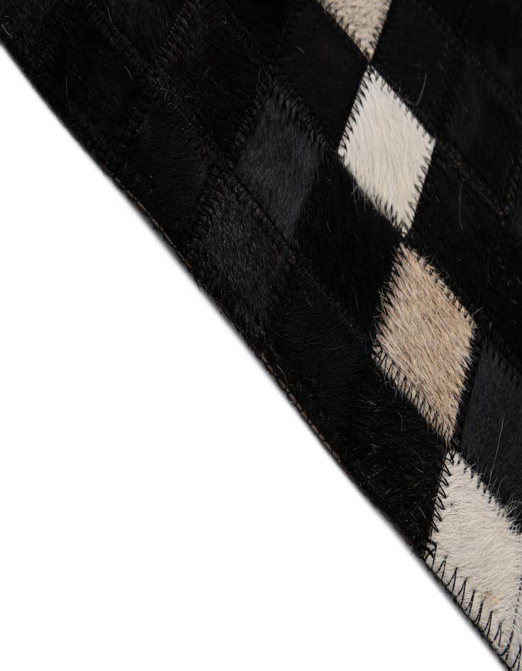 Detail image of 5' 2 x 8' Cowhide - Patchwork Rug