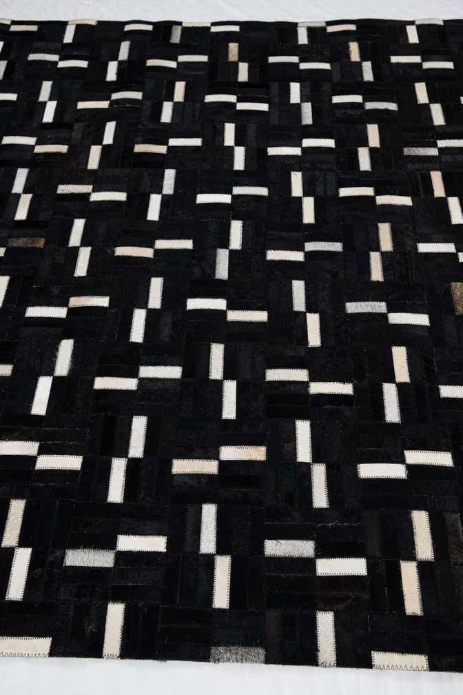 5' 1 x 8' 4 Cowhide Leather Rug