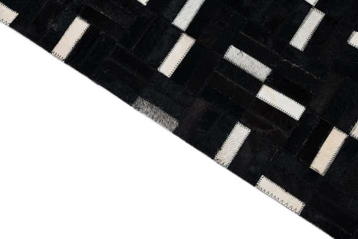 5' 1 x 8' 4 Cowhide Leather Rug