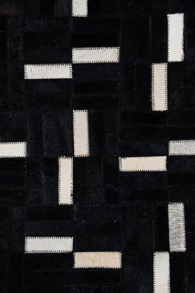 5' 1 x 8' 4 Cowhide Leather Rug